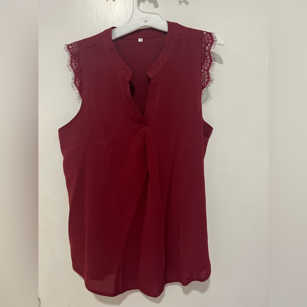 Women’s red blouse. Size medium.